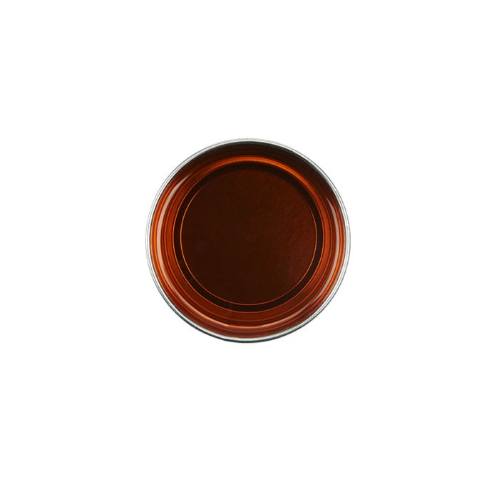 Top view of an open can of GiGi Facial Honee Soft Wax showcasing its deep brown translucent colored wax contents