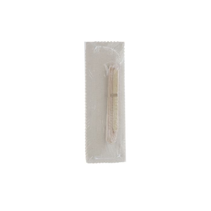 A well-sealed pack of hair removal strips together with its wooden applicator