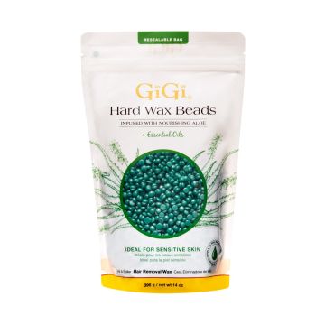 Front view of Hard Wax Beads Infused with Nourishing Aloe pouch packaging with a window showing aloe colored wax granules